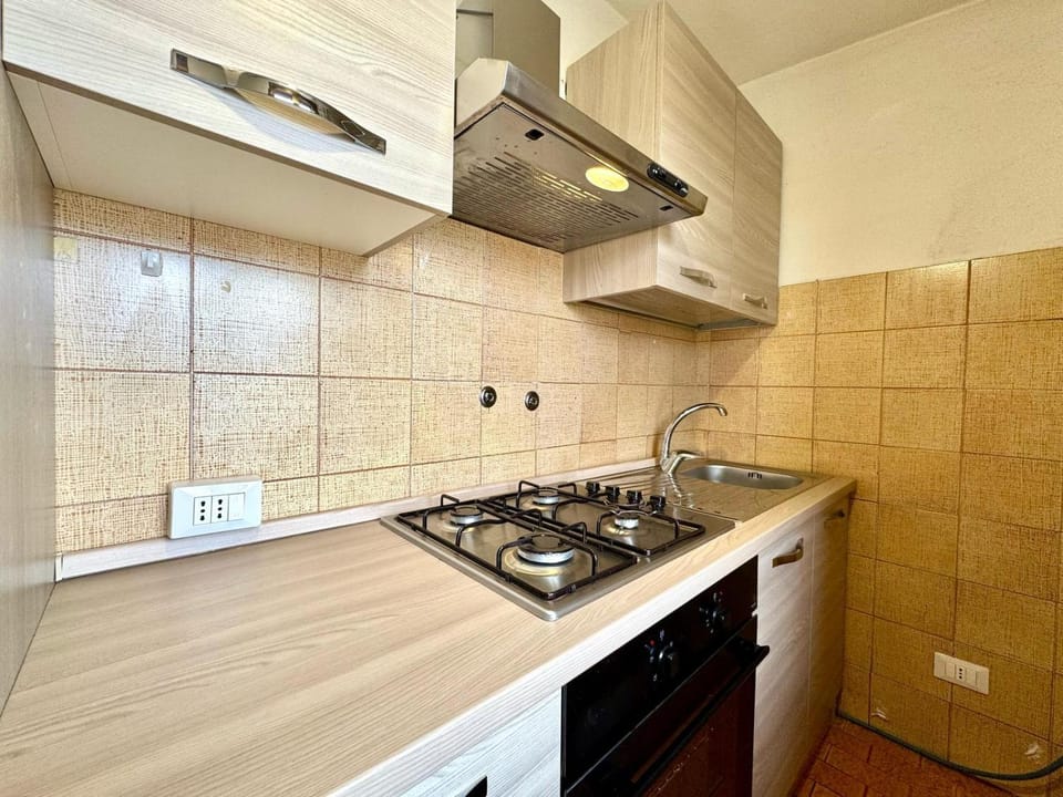 Kitchen or kitchenette, stove