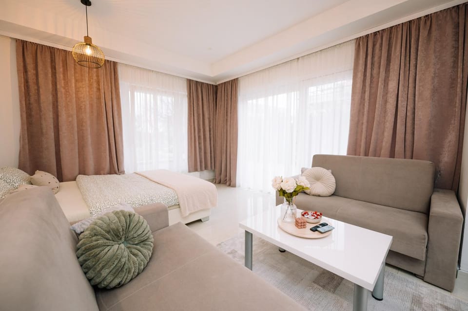 Bed, Living room, Seating area, Bedroom
