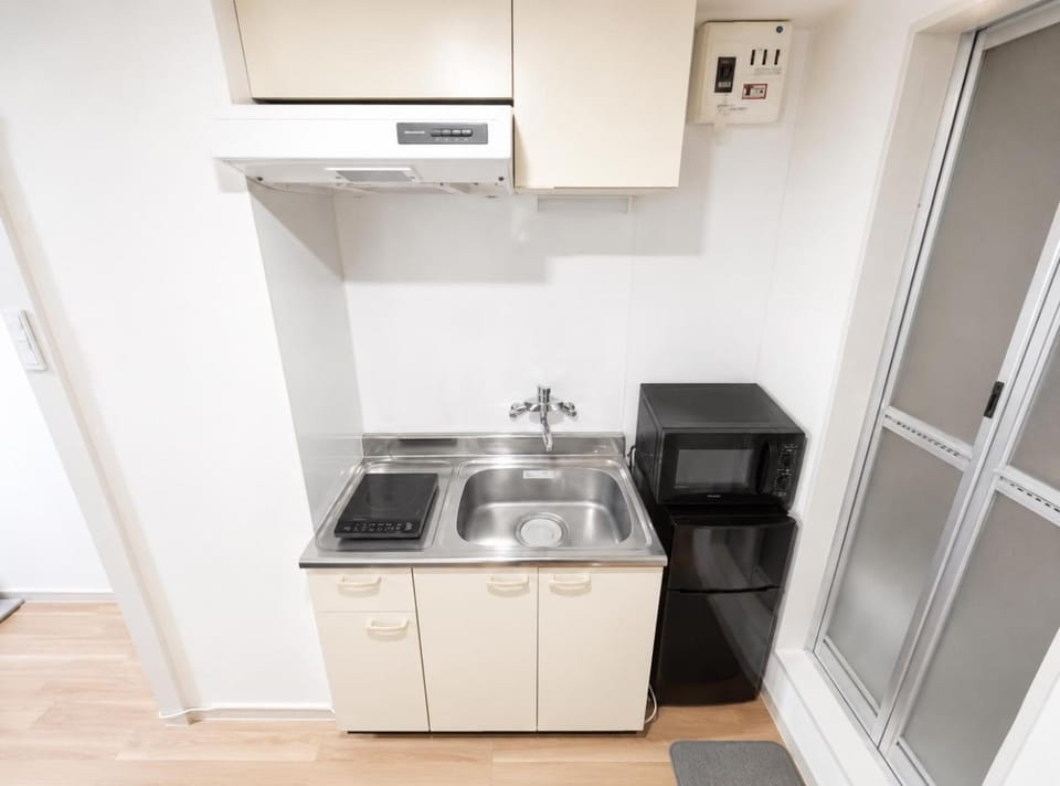 Kitchen or kitchenette, stove, kitchen