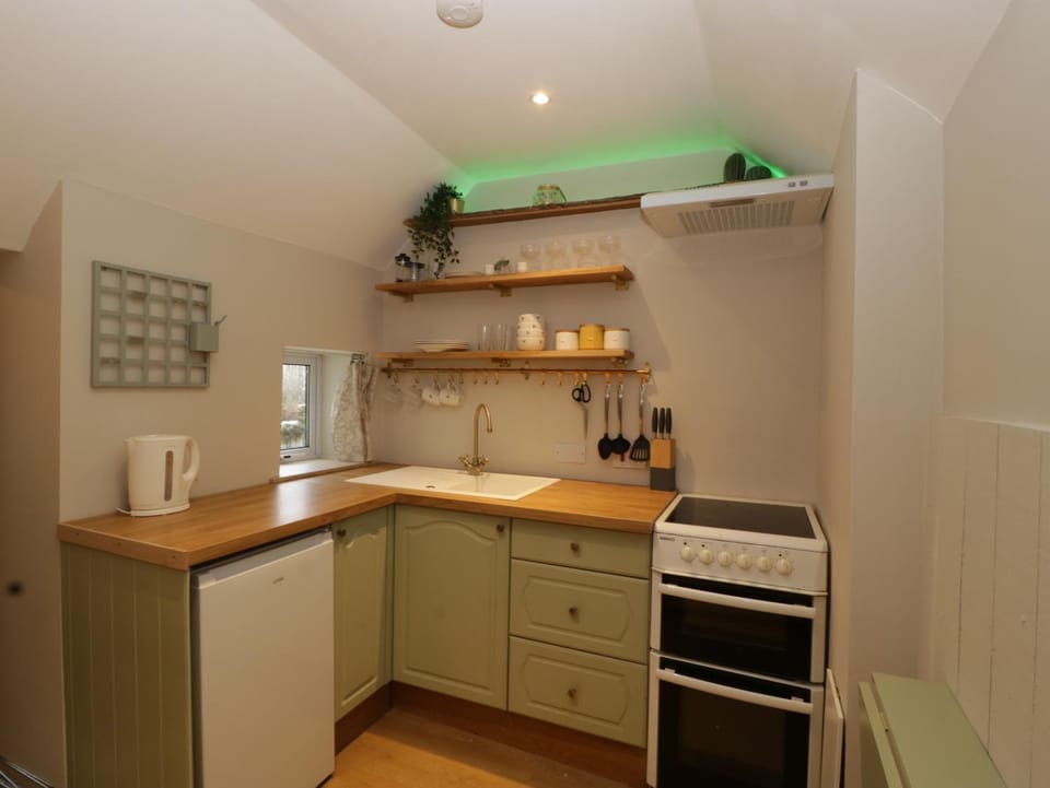 Kitchen or kitchenette, oven, stove