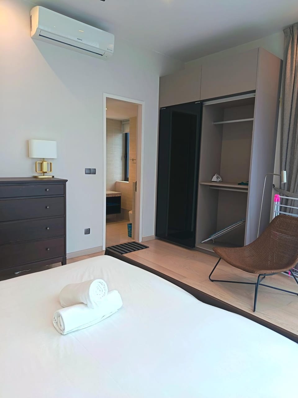 Bed, Photo of the whole room, Seating area, Bedroom, towels, wardrobe, air conditioner