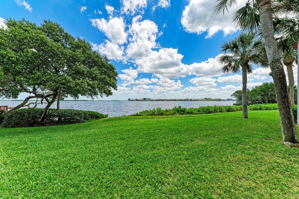 Blissfull Bay: Runaway Bay - Bayfront Condo! Largest Heated Pool by Anna Maria Life Vacation Rentals House in Bradenton Beach