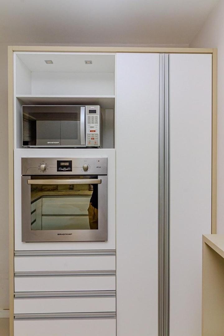 Kitchen or kitchenette, microwave, oven