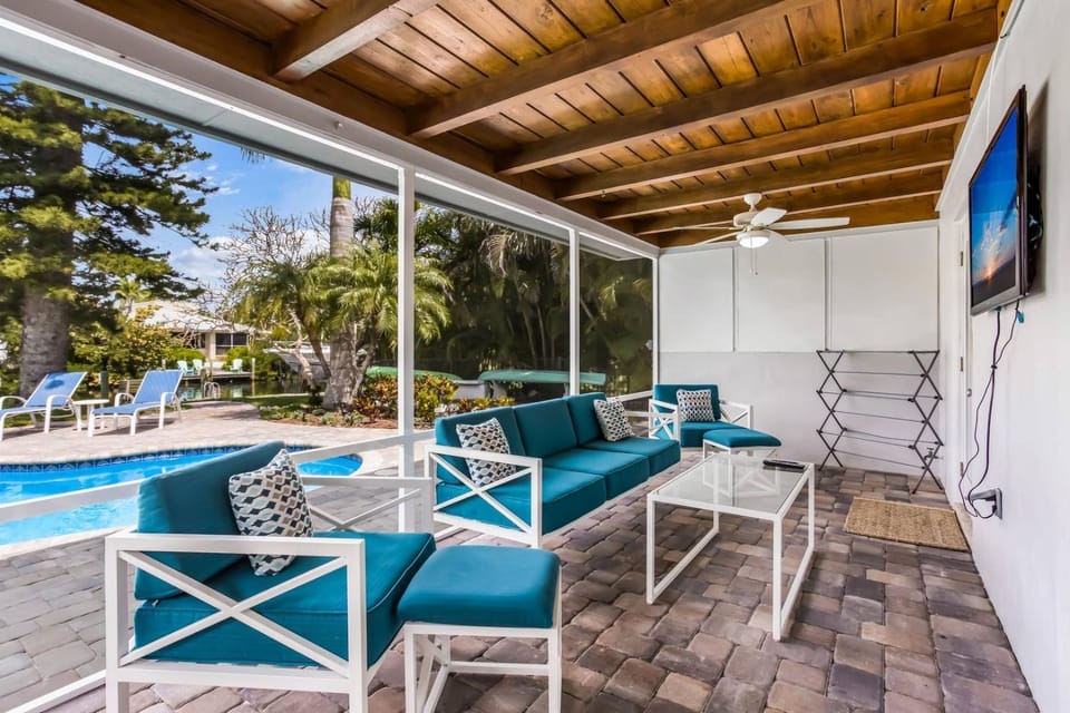 Canal Place: Boat Dock, Pool & Spa, On Canal by Anna Maria Life Vacation Rentals House in Holmes Beach