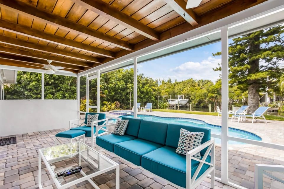 Canal Place: Boat Dock, Pool & Spa, On Canal by Anna Maria Life Vacation Rentals House in Holmes Beach