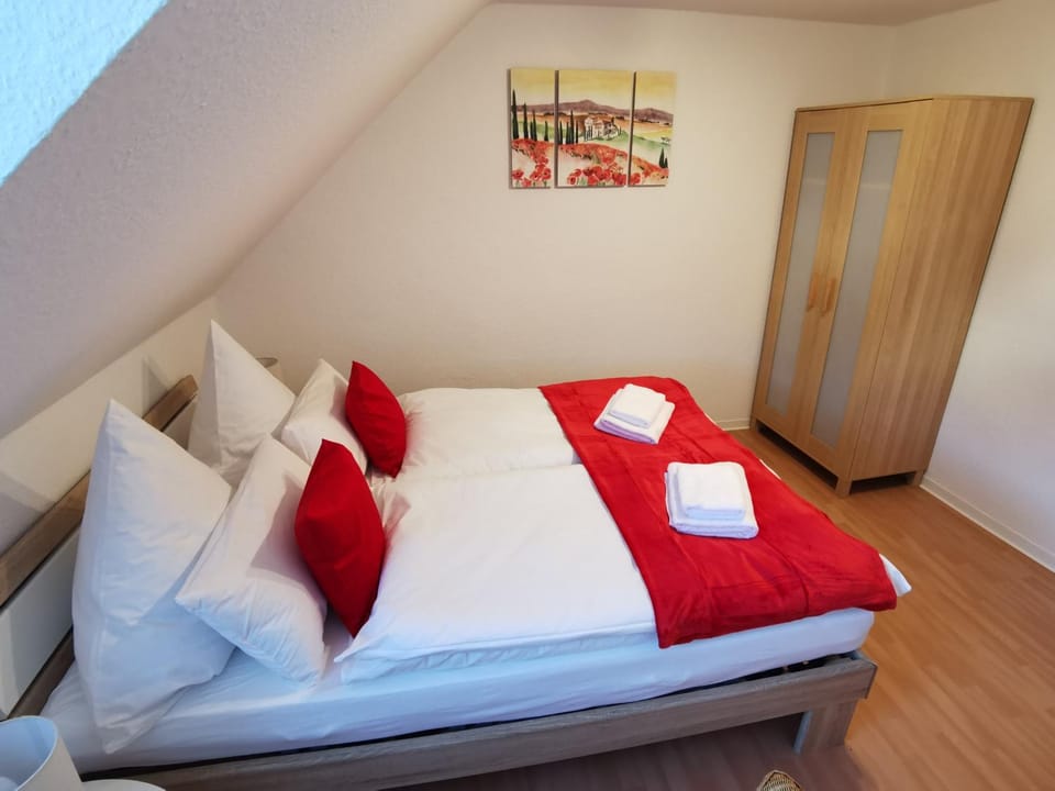 Bed, Photo of the whole room, towels, wardrobe