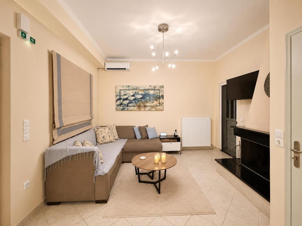 TV and multimedia, Living room, Seating area, fireplace, air conditioner