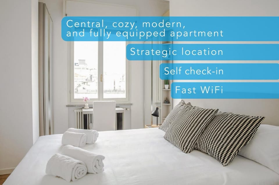 Bed, Photo of the whole room, Bedroom, Text overlay, cot, towels