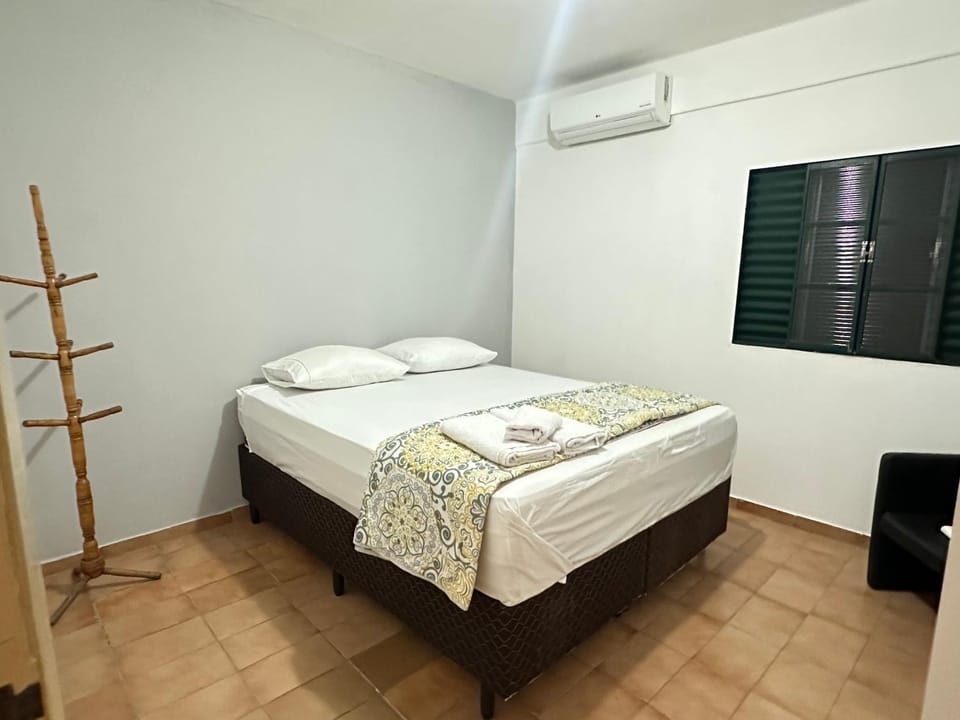 Bed, Photo of the whole room, Bedroom, towels, air conditioner
