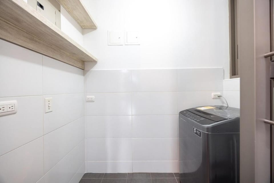 Kitchen or kitchenette, washing machine
