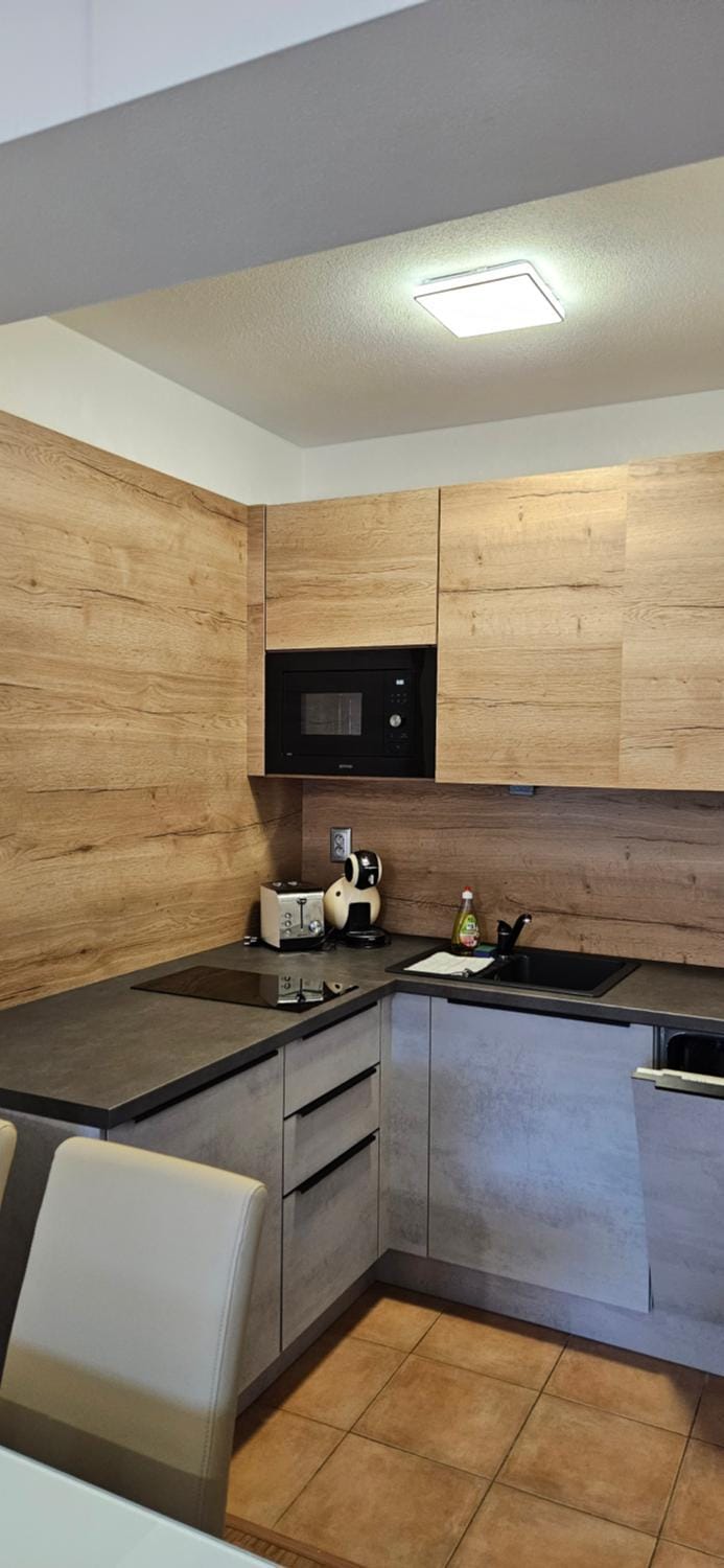 Kitchen or kitchenette, stove