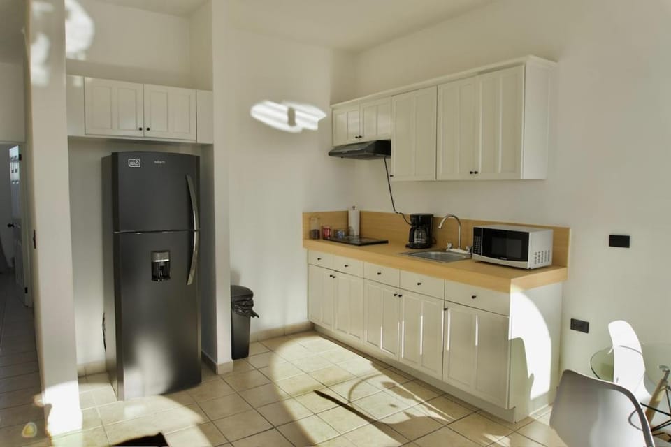 Kitchen or kitchenette, oven