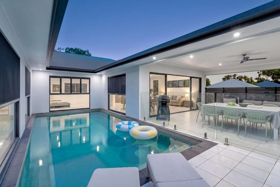 Patio, Seating area, Swimming pool, sunbed