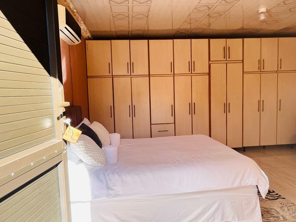 Shower, Toilet, Bed, Bathroom, TV and multimedia, Bedroom, furniture, internet, microwave, wardrobe, air conditioner