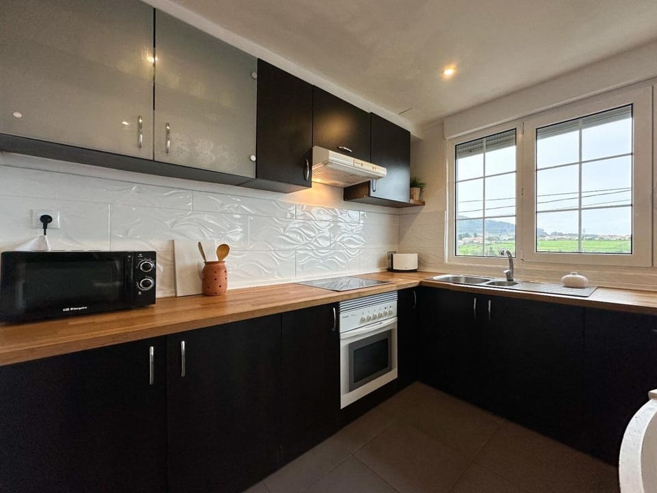 Kitchen or kitchenette, oven, stove