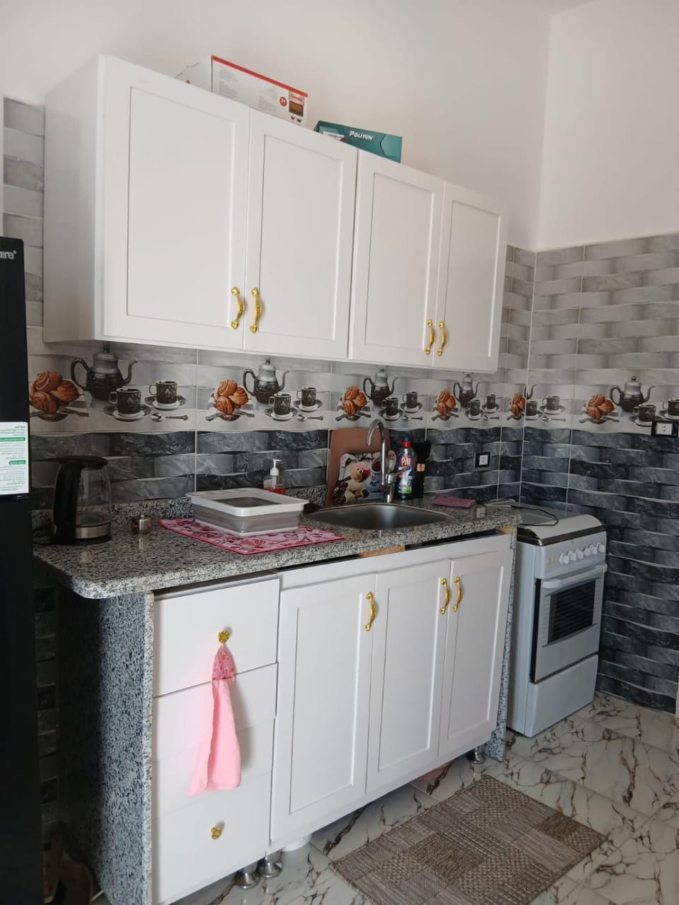Kitchen or kitchenette, stove