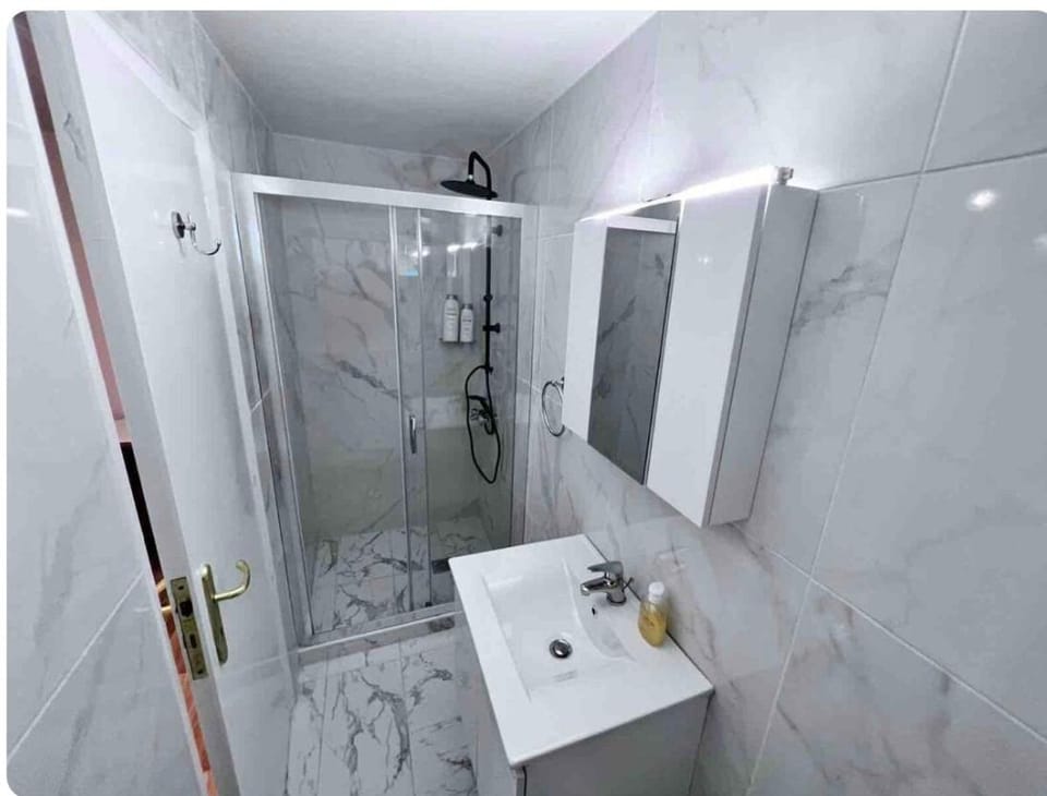 Glyfada center apartment with private yard Apartment in South Athens