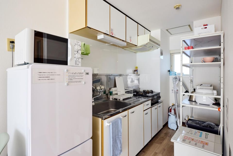 Kitchen or kitchenette, stove, toaster