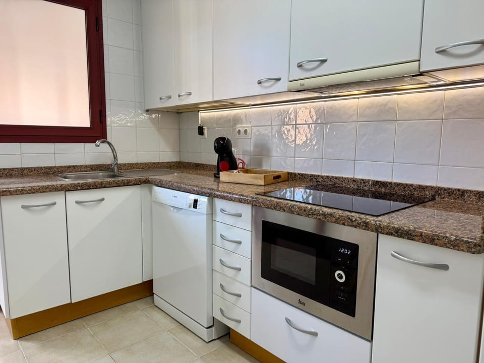 Kitchen or kitchenette, stove, kitchen