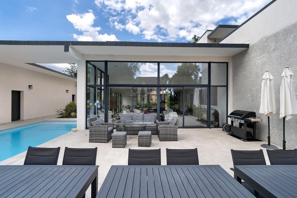 Property building, Living room, Swimming pool