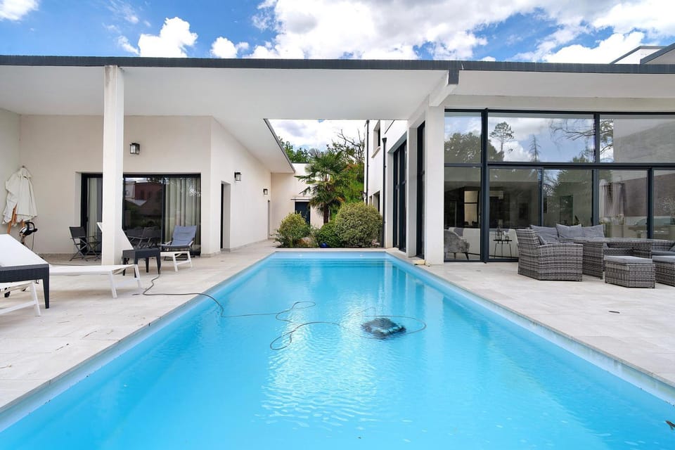 Property building, Living room, Swimming pool