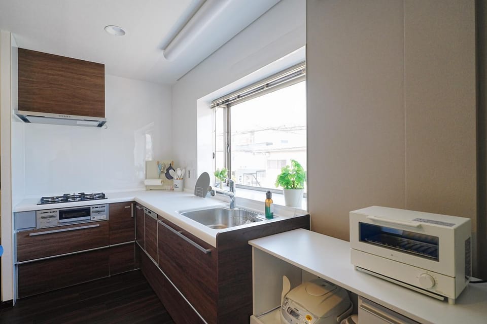 Kitchen or kitchenette, stove, toaster