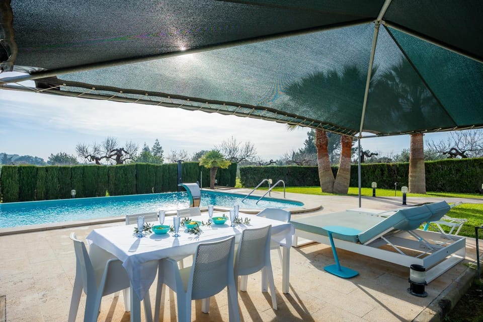 Property building, Living room, Swimming pool
