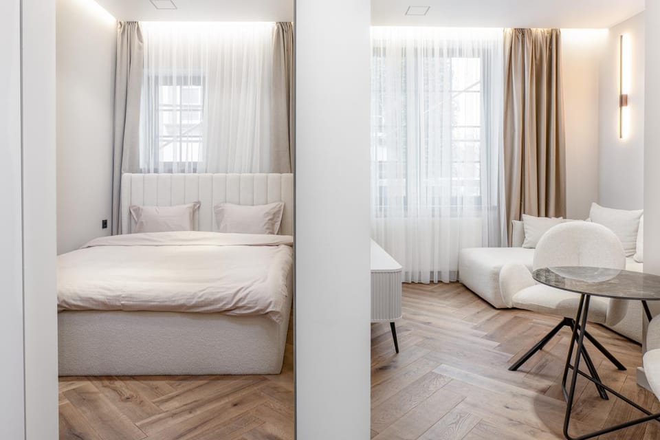 Bed, Living room, Seating area, Bedroom