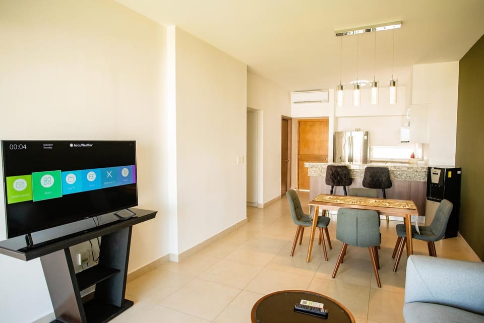 TV and multimedia, Kitchen or kitchenette, Living room, Seating area, Dining area, air conditioner