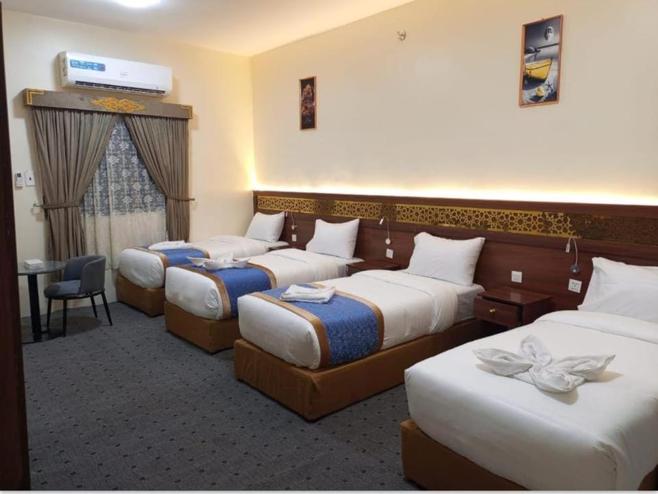 Bed, Bedroom, room service, towels, air conditioner