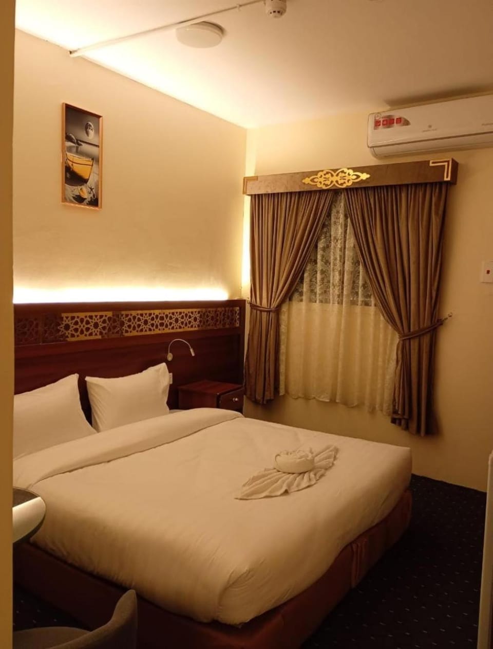 Bed, Photo of the whole room, Bedroom, towels, air conditioner