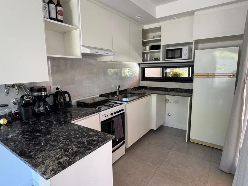 Kitchen or kitchenette, oven