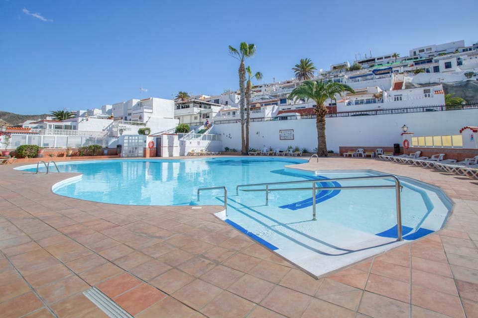 Property building, Living room, Swimming pool