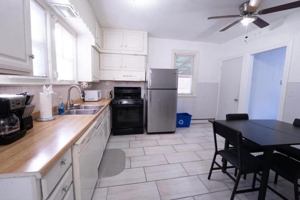 Dining area, dishwasher, microwave, oven, stove, kitchen