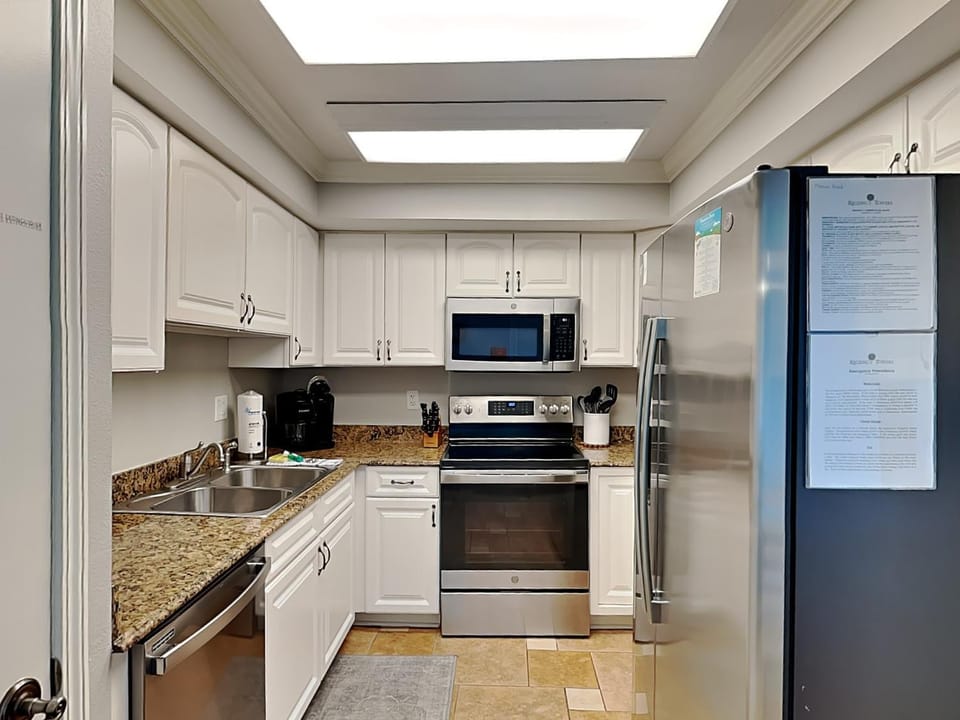 Kitchen or kitchenette, microwave, oven, stove, kitchen