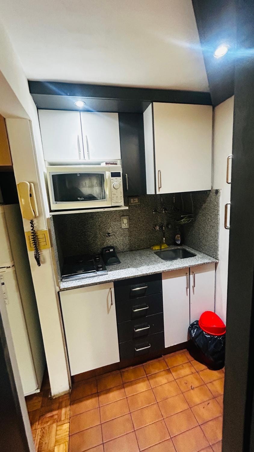 Kitchen or kitchenette, stove