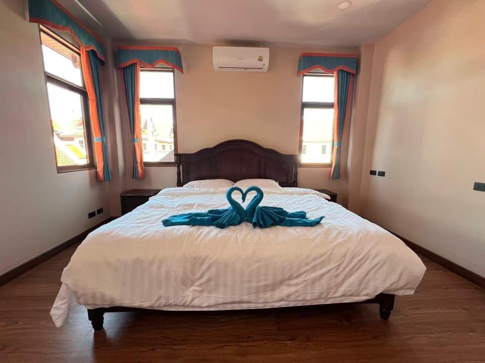 Bed, Photo of the whole room, Bedroom, towels, air conditioner