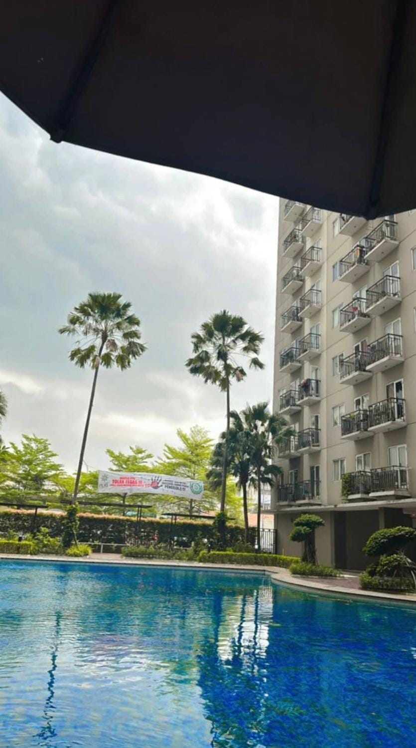Apartemen puri park view Best view pool shein Apartment in Jakarta
