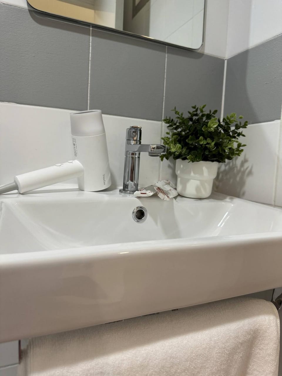 Bathroom, hair dryier, towels
