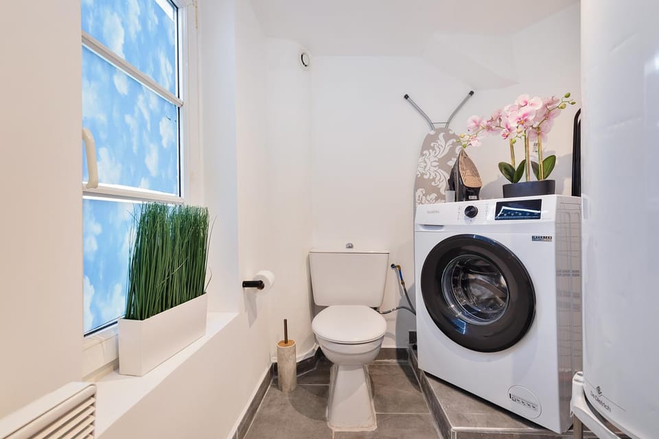 Bathroom, flat iron, washing machine