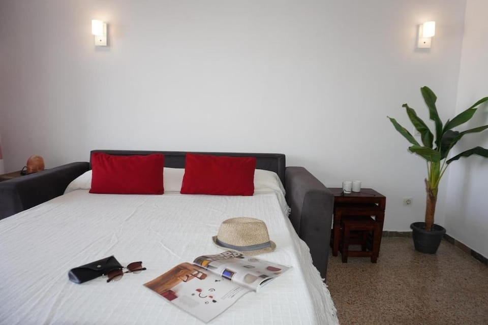 Bed, Living room, Seating area, Bedroom