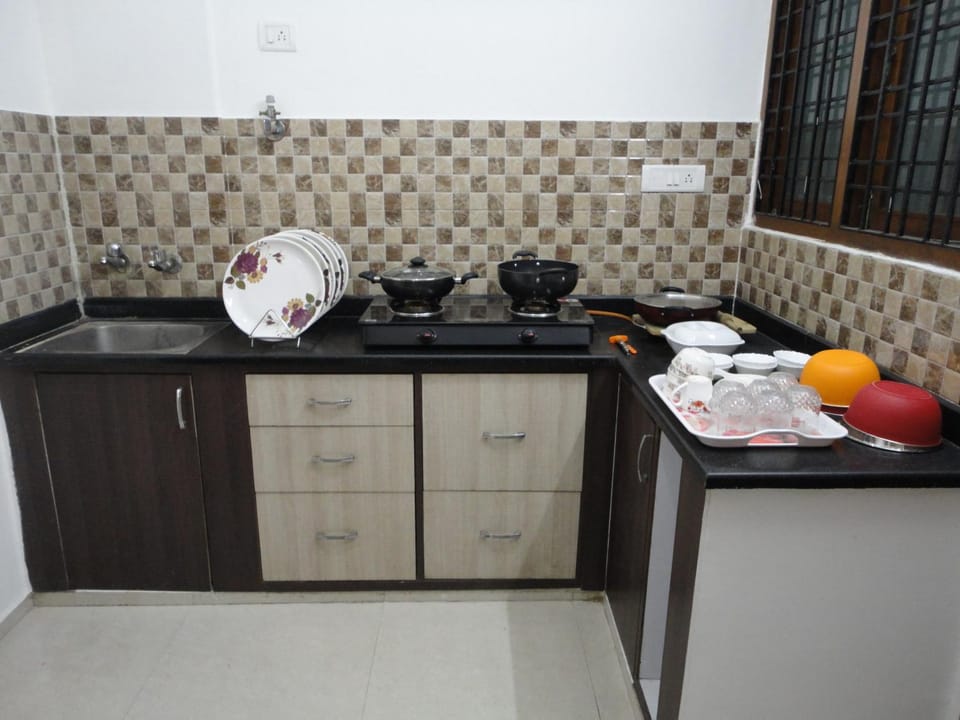 Kitchen or kitchenette, stove