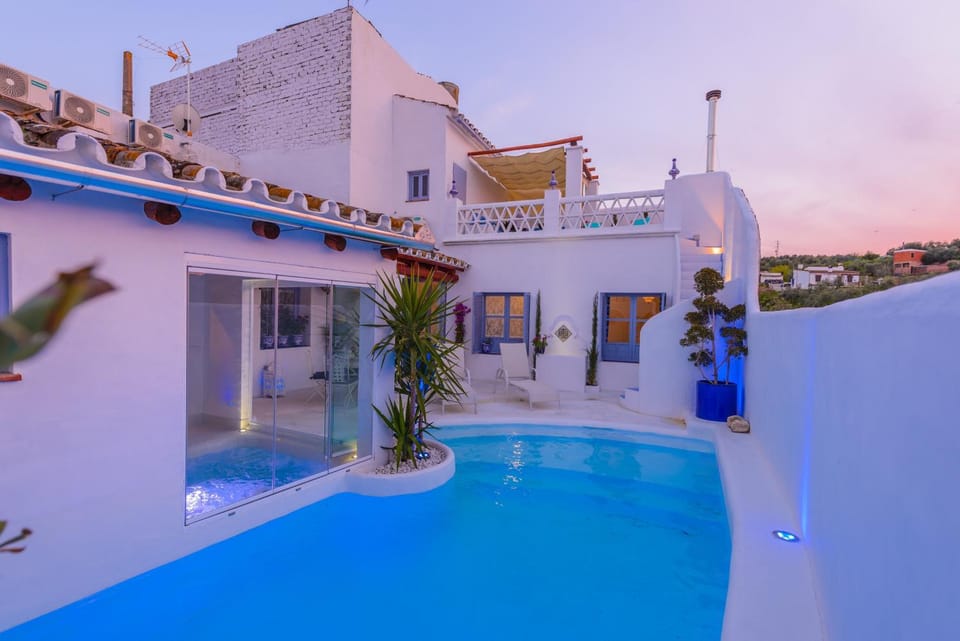 Property building, Living room, Swimming pool