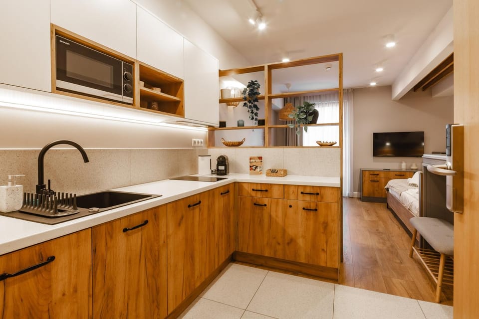 Kitchen or kitchenette, dishwasher, microwave, oven