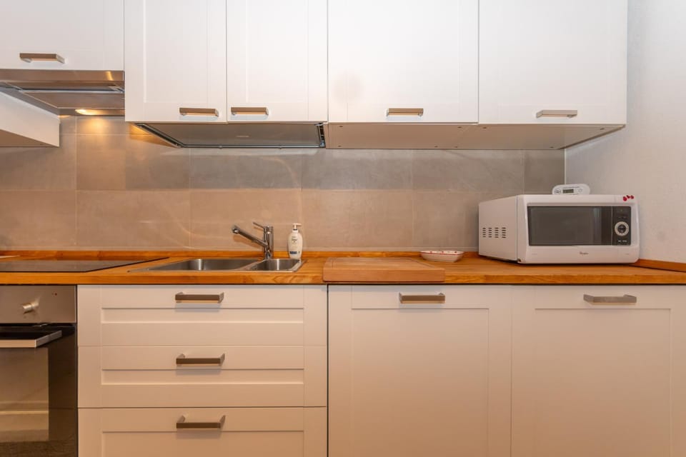 Kitchen or kitchenette, stove