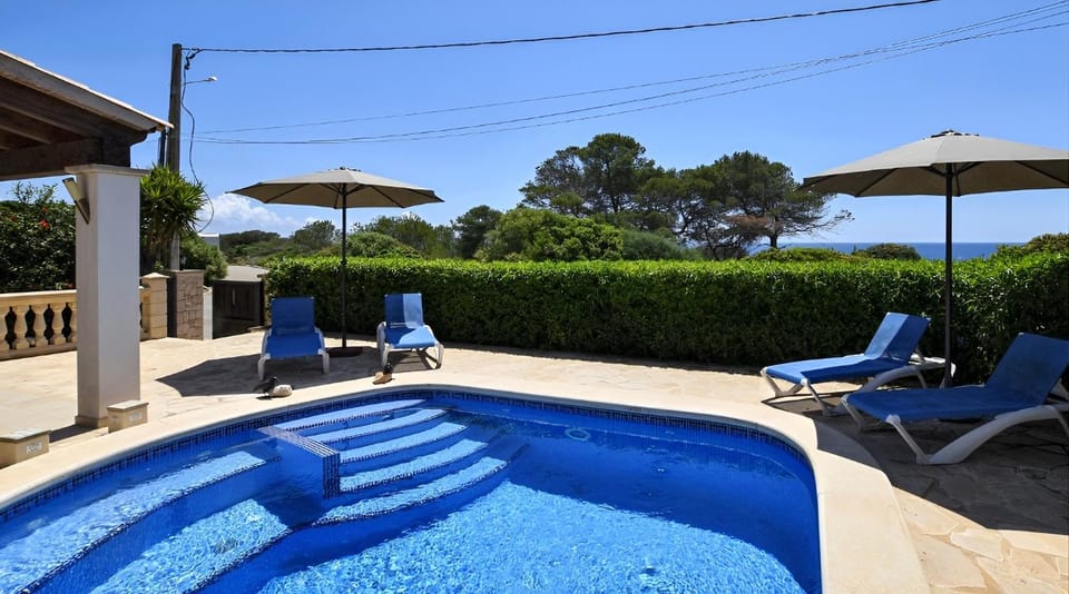 Property building, Living room, Swimming pool