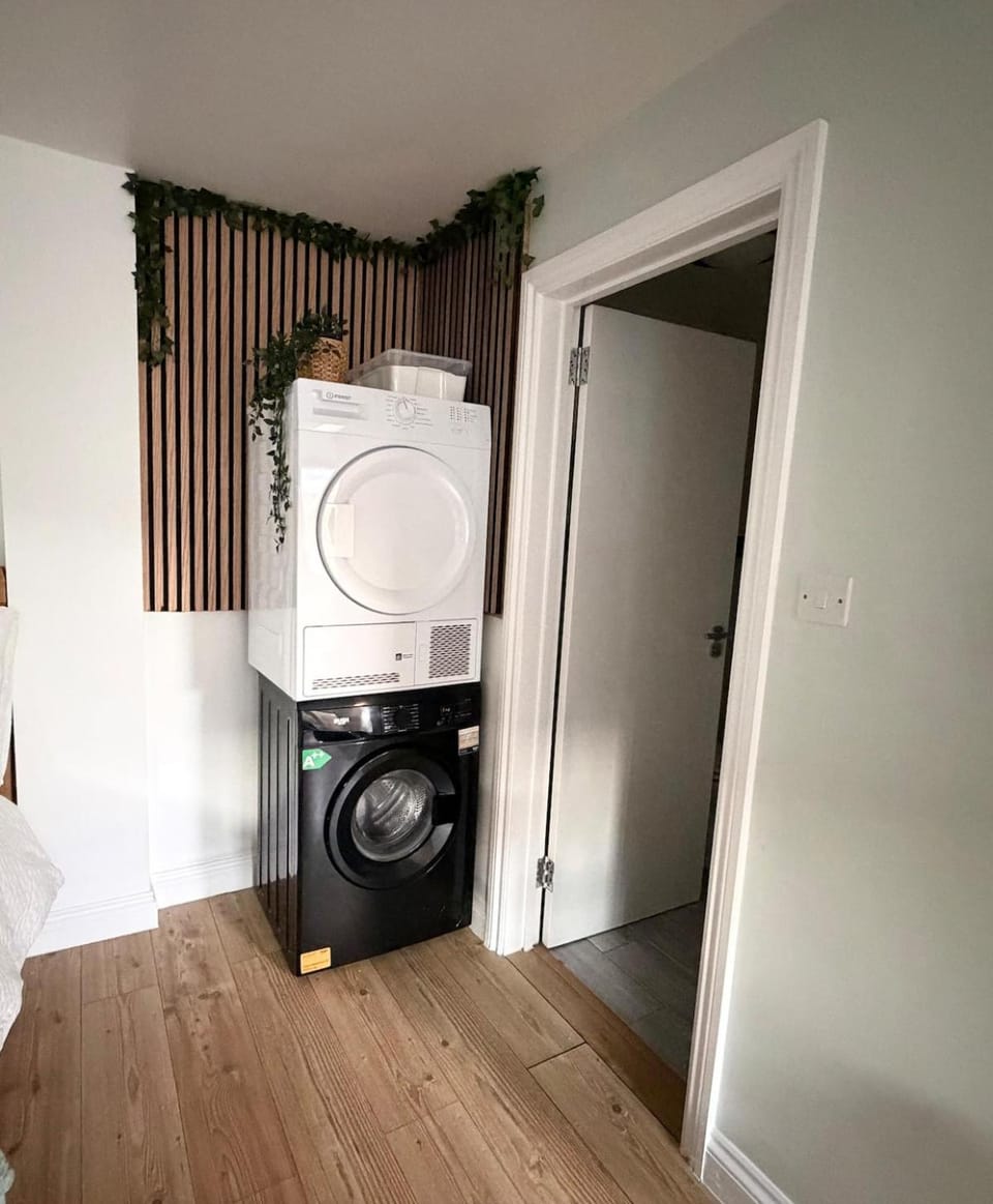 Kitchen or kitchenette, wardrobe, washing machine, dryer