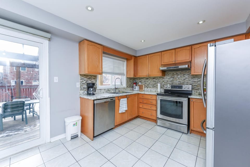 Kitchen or kitchenette, dishwasher, oven, stove, toaster