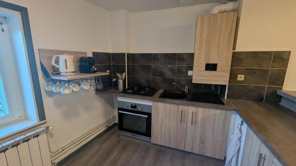 Kitchen or kitchenette, oven, stove, toaster