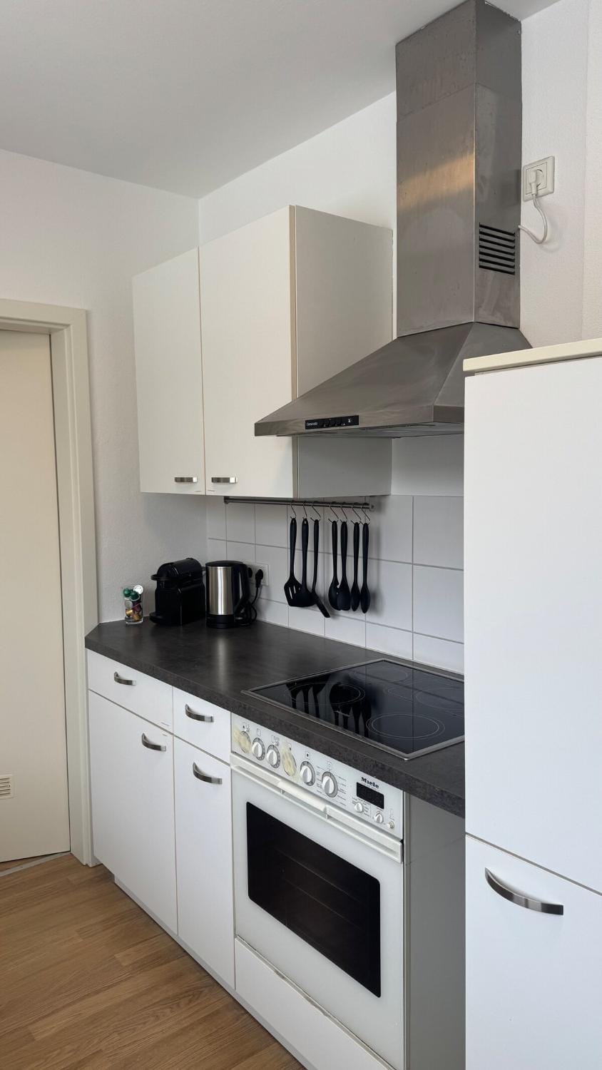 Kitchen or kitchenette, oven, stove